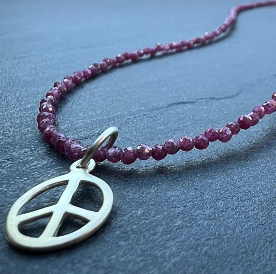 RUBY NECKLACE WITH PEACE PENDANT